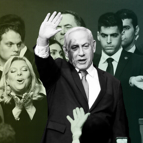 Israeli Prime Minister Benjamin Netanyahu stands next to his wife Sara as he waves to supporters following the announcement of exit polls in Israel's election at his Likud party headquarters in Tel Aviv, Israel March 3, 2020. REUTERS/Amir Cohen - RC21CF9UTZBQ