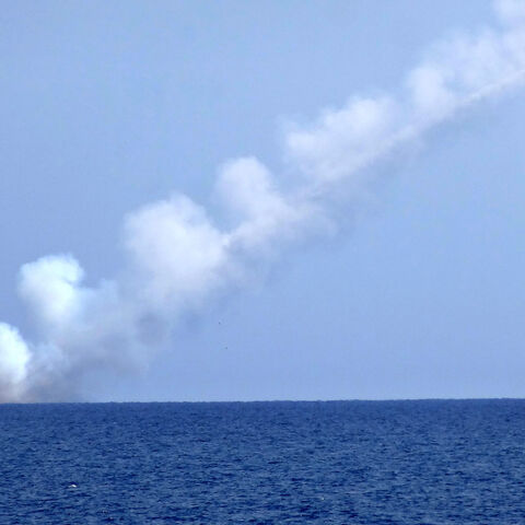 A picture shows a Russian cruise missile launching from a submarine at an undisclosed location in the Mediterranean Sea on September 14, 2017. - The Russian Defence Ministry launched cruise missiles from submarines in the Mediterranean aimed at Islamic State targets in eastern Syria. (Photo by Maria Antonova. / AFP) (Photo by MARIA ANTONOVA./AFP via Getty Images)