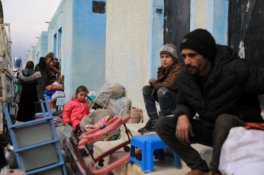 The displaced Syrians as they arrived at the new housing complex