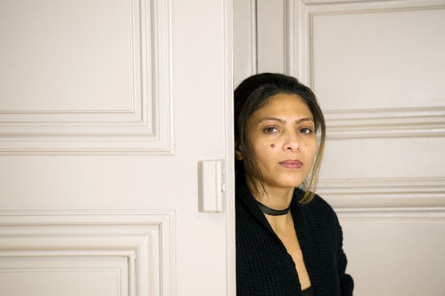 Ensaf Haidar, wife of jailed Saudi blogger Raif Badawi, poses for pictures in Paris in 2018