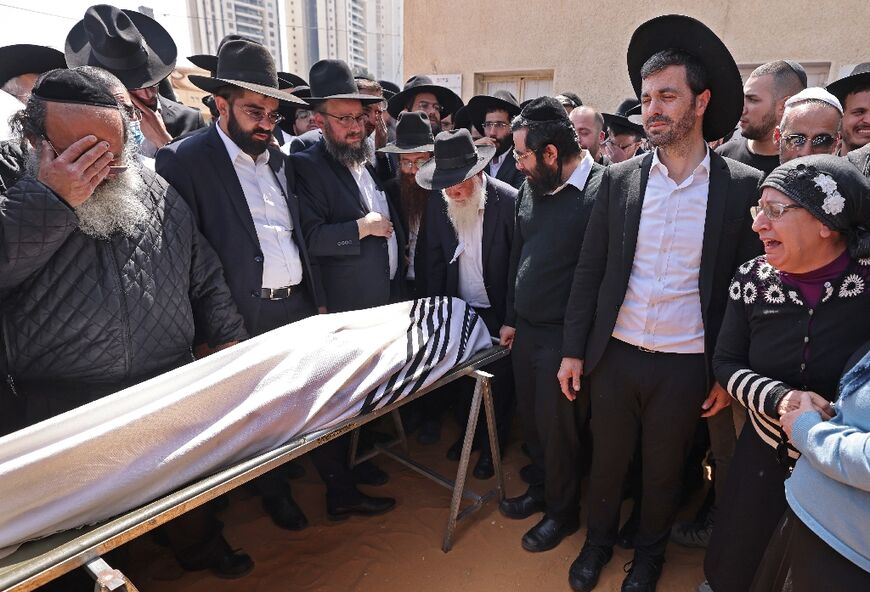 Israeli mourners attend the funeral of Avishai Yehezkel, one of five people killed in a shooting attack in the ultra-religious city of Bnei Brak