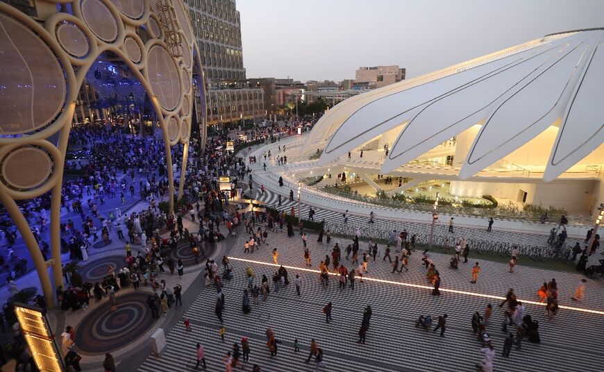 The site, with its canopied walkways and speakers playing soothing music, is now envisaged as a car-free "15-minute city", with all parts accessible by foot or bicycle within a quarter of an hour