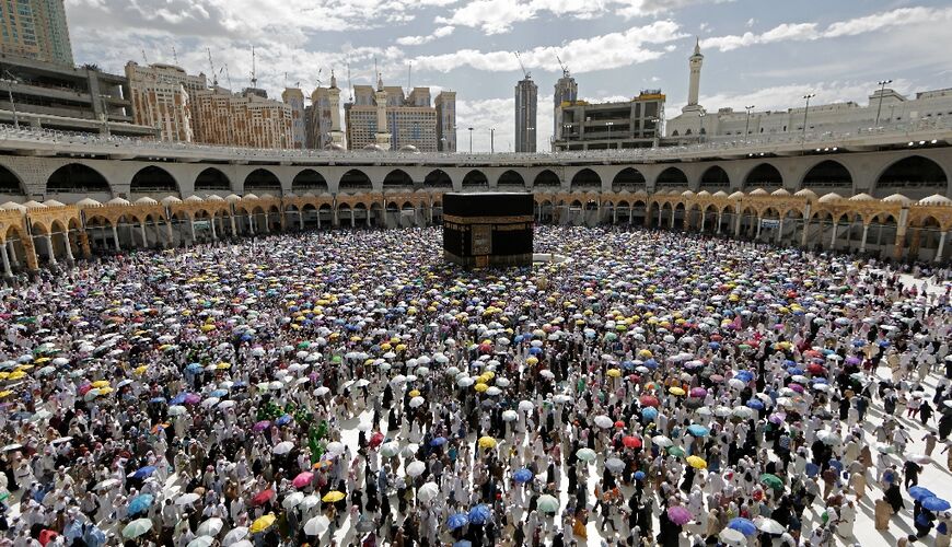 Muslim pilgrims perform the final walk around the Kaaba, Islam's holiest shrine, in this file photo from 2019: One of the five pillars of Islam, the hajj must be undertaken by all Muslims with the means at least once in their lives