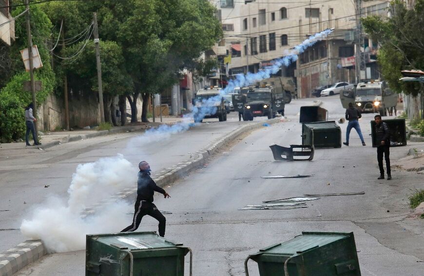 Israeli troops clash with Palestinians in Nablus after entering the West Bank city with Jewish builders to carry out repairs at a flashpoint religious site