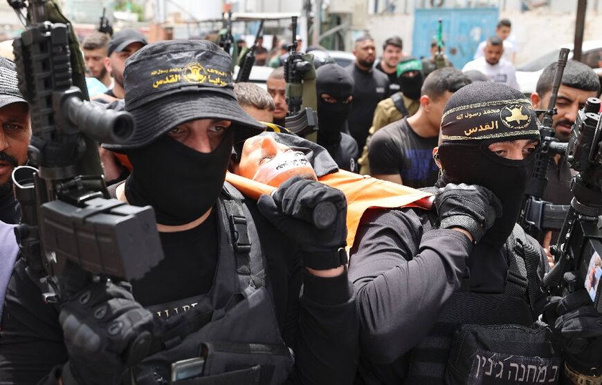 At Fayed's funeral in the Jenin refugee camp, armed members of the militant group carried his coffin.