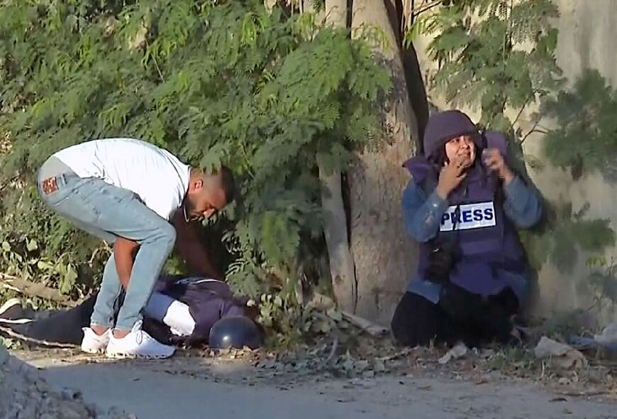 An image grab from Al Jazeera footage shows veteran journalist Shireen Abu Akleh after she was fatally shot in Jenin in the occupied West Bank on May 11, 2022