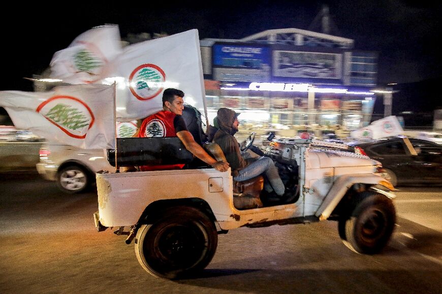 Supporters of the Christian Lebanese Forces party celebrate on election night