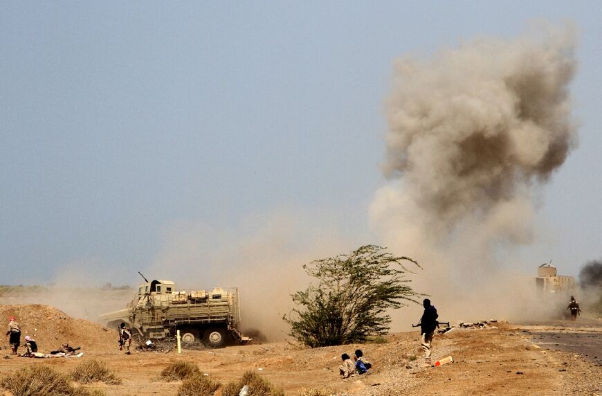 A landmine explodes as Yemeni loyalist forces patrol an area near the Red Sea port town of Mocha on January 20, 2017