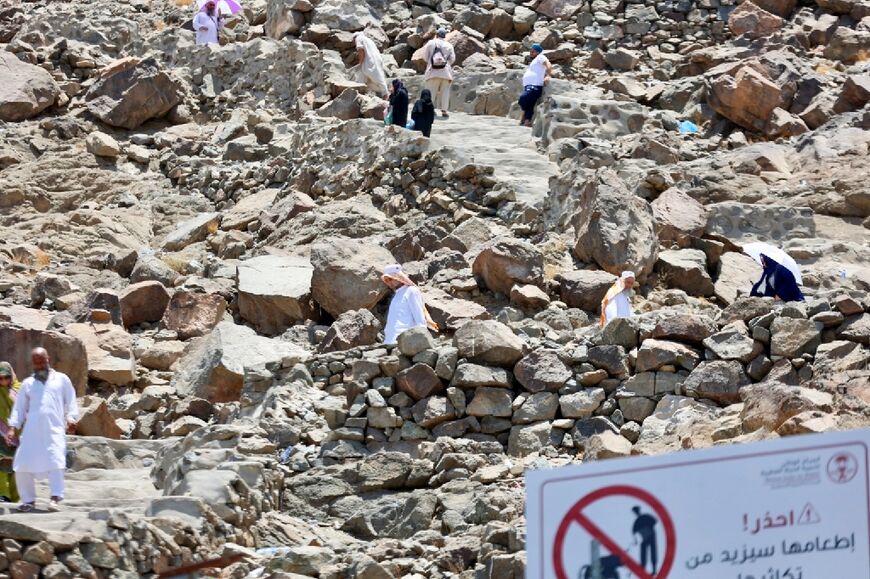 Muslim pilgrims visit Noor mountain in the holy city of Mecca on July 4, 2022, two days before the hajj begins