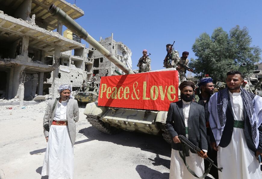 Actors are pictured in the Hajar al-Aswad neighbourhood of the Syrian capital Damascus