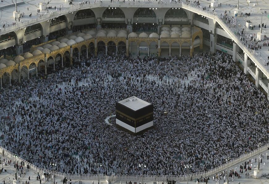 The Kaaba is a large black cubic structure at the centre of Mecca's Grand Mosque towards which Muslims turn to pray wherever they are in the world