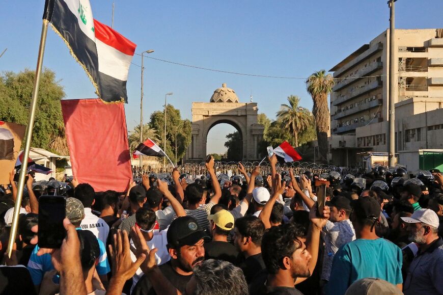 Supporters of Iraqi Shiite cleric Muqtada Sadr: Iraq was plunged deeper into political crisis last month when Sadr's bloc quit en masse