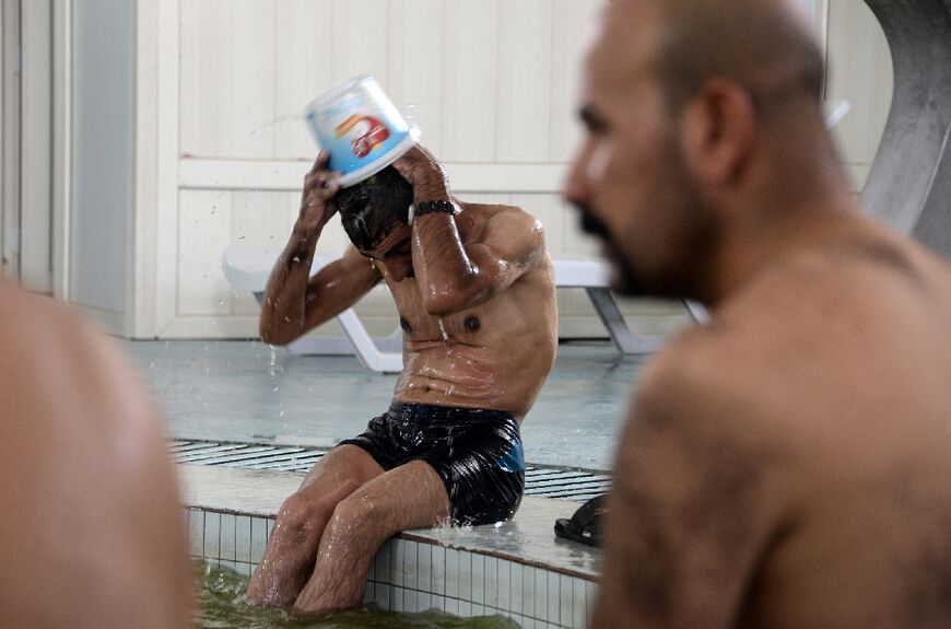 In the Hamam al-Alil baths' newly tiled rooms, men and children enjoy a moment of therapeutic relaxation for 5,000 dinars ($3)