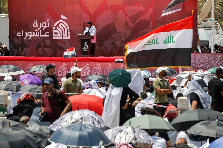 Speaking from a dais, the imam who led the prayer endorsed Sadr's call for early elections and said, 
"Iraq is a prisoner of the corrupt"