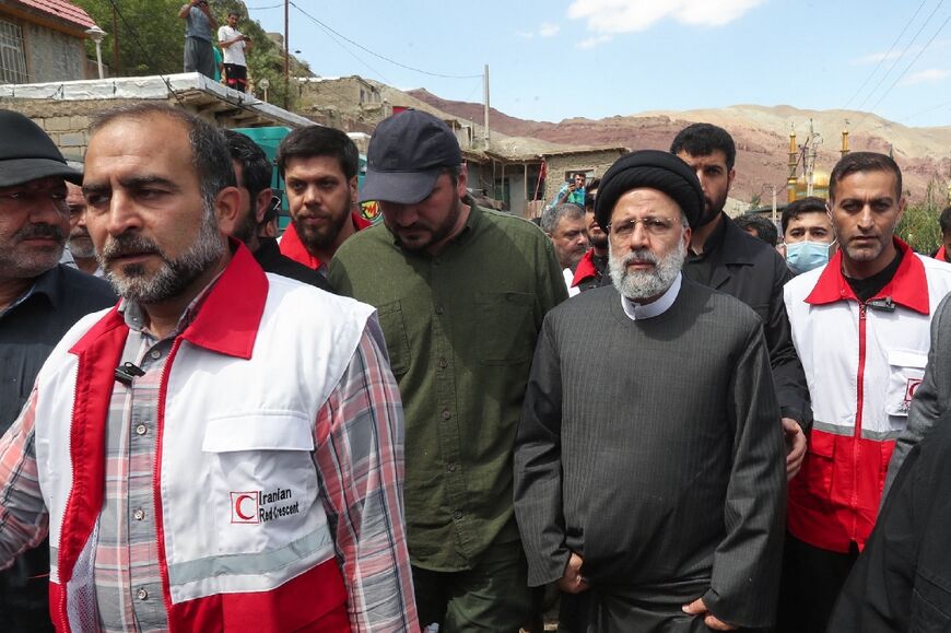 Raisi's black turban signifies direct descent from Islam's Prophet Mohammed, and he has the title of 'hojatoleslam', one rank below ayatollah in the Shiite clerical hierarchy