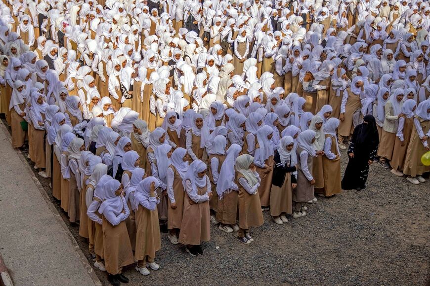 Pupils gather on the first day of the new academic year in Taez