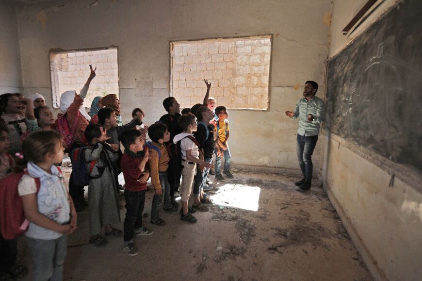 'Because of the war, most of the schools in the city have been destroyed and we cannot repair them,' one teacher said