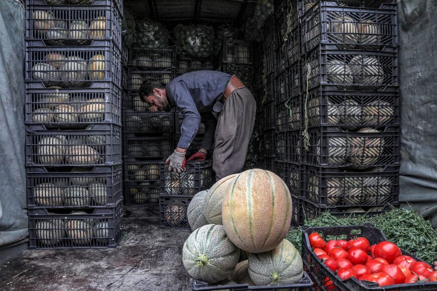 Iranians cross into Iraqi Kurdistan seeking work, amid economic sanctions at home imposed by the United States 