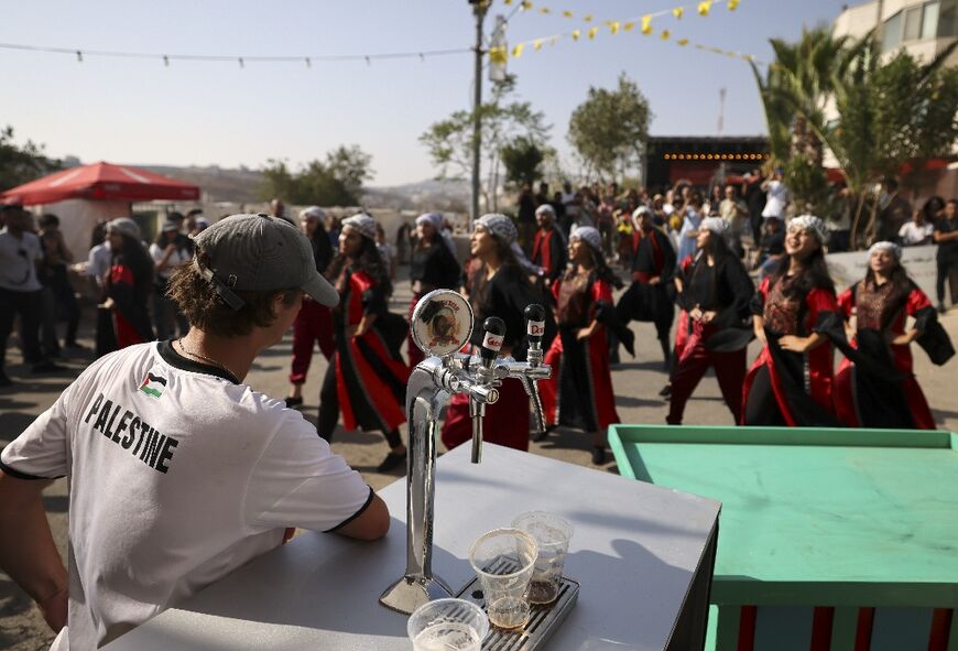 Traditional dancers perform at the annual beer festival in the village of Taybeh