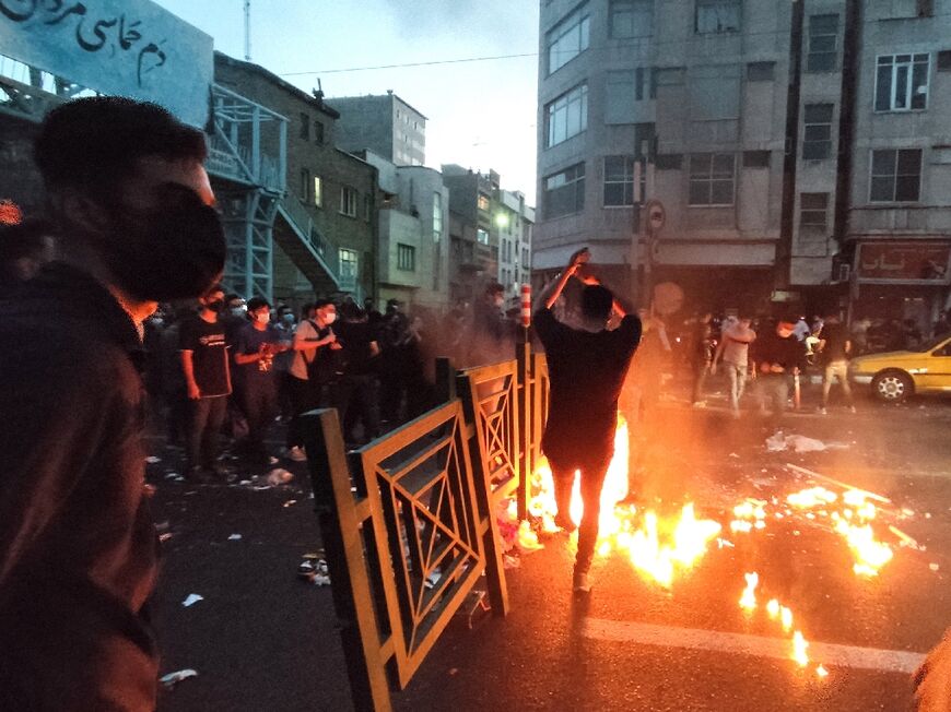 A picture obtained by AFP outside Iran shows demonstrators on the streets of Tehran as protests over the death of young woman in morality police custody spread to cities nationwide