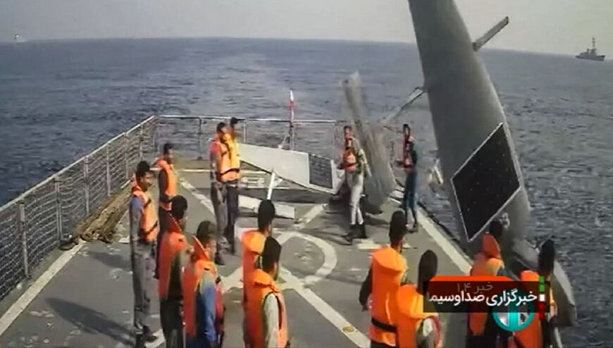 Iranian sailors aboard a destroyer with two US Navy Saildrone unmanned surveillance vessels in the Red Sea. The Iranians gave them back to the US Navy.
