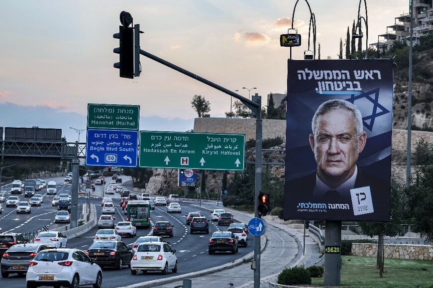 A campaign billboard for Israel's National Unity bloc which includes the Blue and White led by Defence Minister Benny Gantz, along the side of a road in Jerusalem 