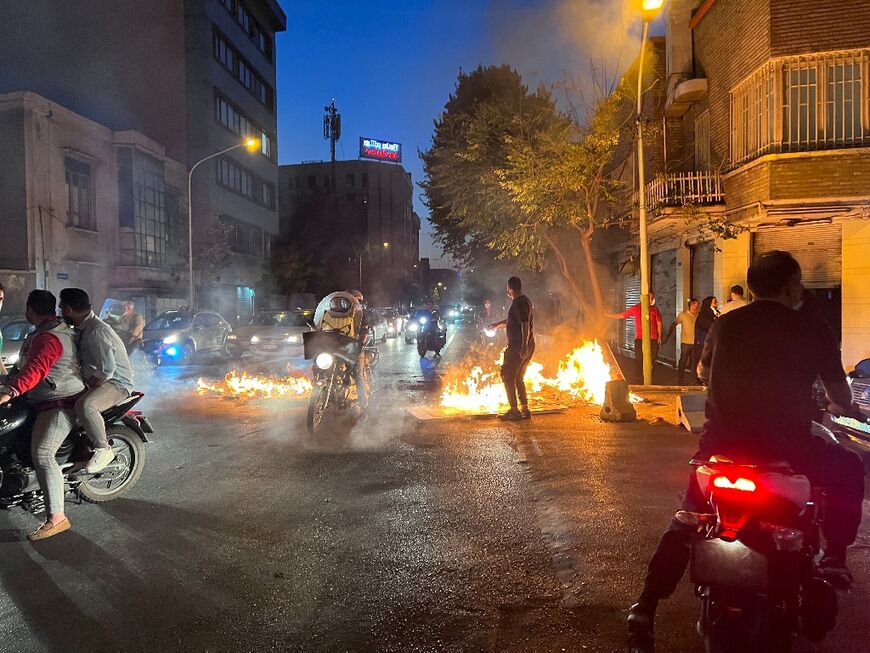 A picture obtained by AFP outside Iran reportedly shows unrest in the capital Tehran on October 8, 2022