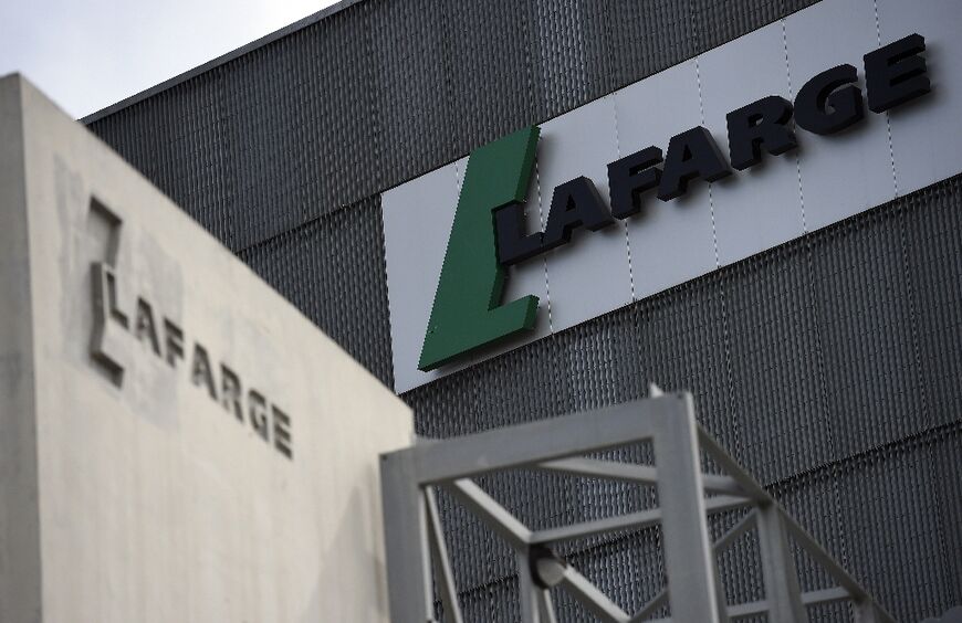 US officials say French cement company Lafarge knowingly made payments to the Islamic State group to build its business in Syria US officials say French cement company Lafarge knowingly made payments to the Islamic State group to build its business in Syria