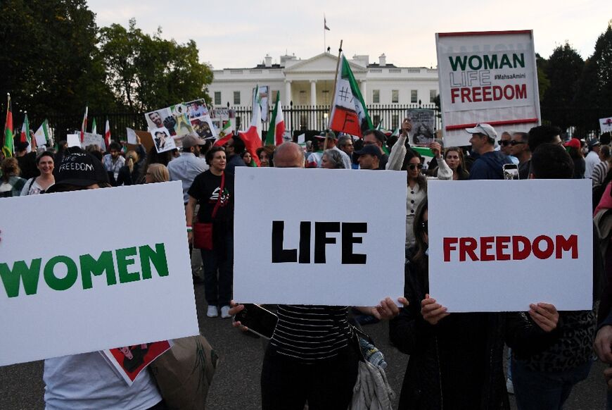 People march in solidarity with protesters in Iran in front of the White House