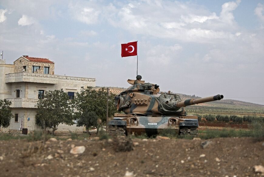 Turkish troops are pictured in the area of Kafr Jannah on the outskirts of the Syrian town of Afrin on October 18