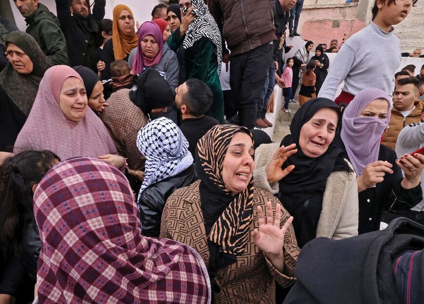 Friends and family attend the funeral of Palestinian teenager Fulla al-Masalma who was shot dead by Israeli troops on Monday the day before she would have turned 16