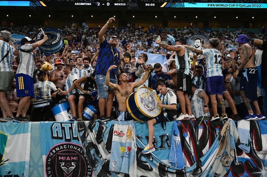 While poor migrant workers watched at a cheaper venue elsewhere in Doha, wealthier Argentina fans celebrated at Lusail Stadium 