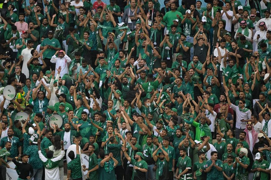 Saudi Arabia supporters celebrate their victory in the Qatar 2022 World Cup Group C football match against Argentina at the Lusail Stadium