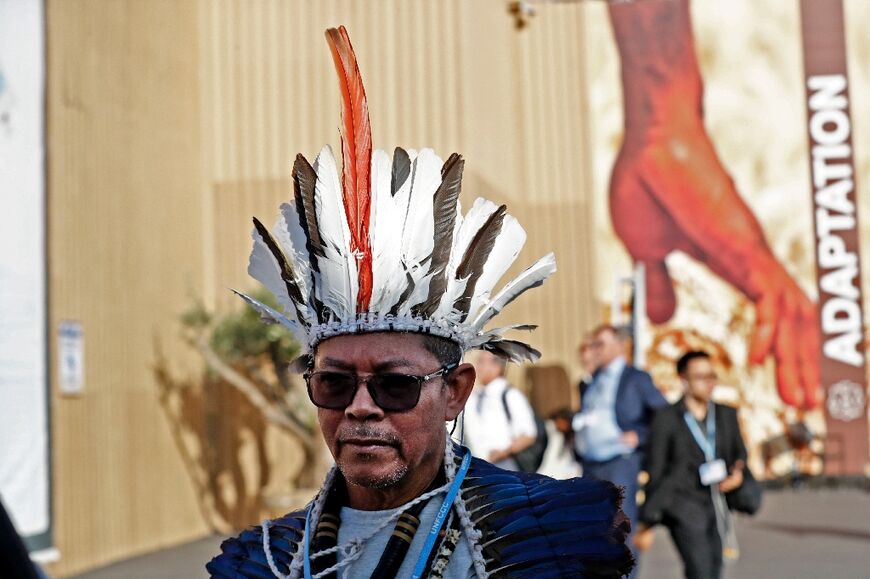 Delegates walk outside during the COP27 climate conference at the Sharm el-Sheikh International Convention Centre