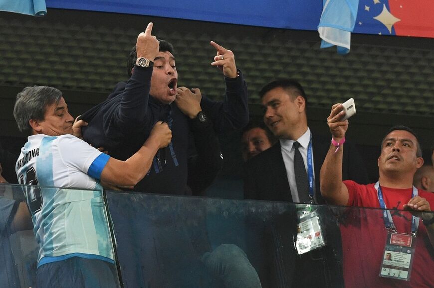 Finger of God: Diego Maradona gestures after Argentina score to beat Nigeria in Saint Petersburg in the 2018 World Cup
