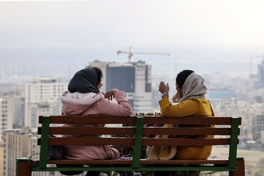 Iran's parliament and the judiciary are reviewing a law which requires women to cover their heads, and which triggered more than two months of deadly protests, the attorney general said