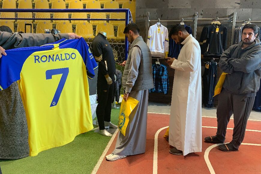 Fans queue for Ronaldo's number 7 jersey at the Saudi Al Nassr FC shop in Riyadh