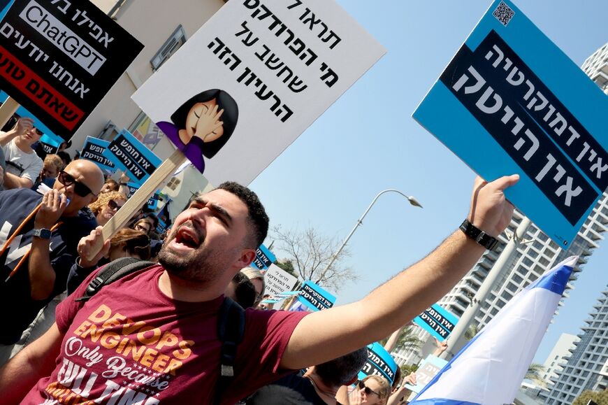 Protesting high-tech workers say their industry would suffer if foreign firms lost confidence in Israel's legal system and democratic principles