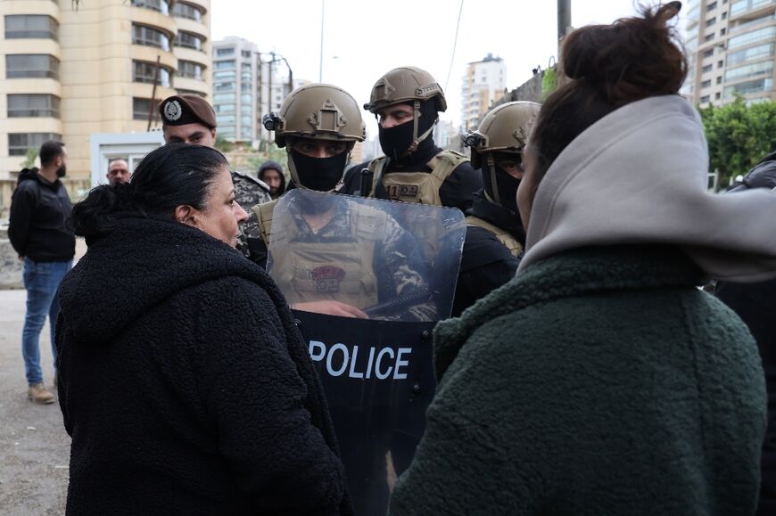 William Noun's mother Zeina outside the police station where her son was held