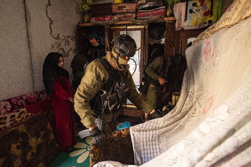 Hundreds of heavily armed fighters patrolled Raqa's streets, under the gaze of worried parents