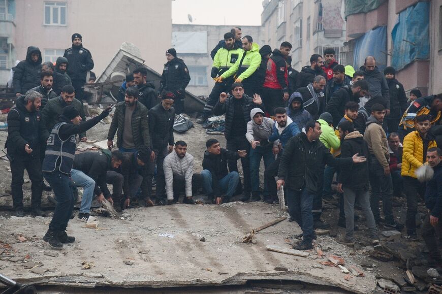 Buildings lay in ruins around the southeastern city of Diyarbakir