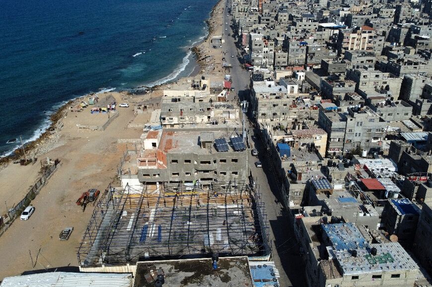 Some in Gaza's Al-Shati refugee camp say the road project causes hardship to the community