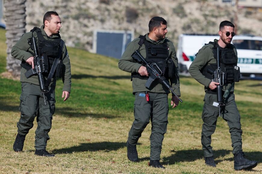 Israeli security forces secure an area near an entrance to the Israeli settlement of Maale Adumim, in the occupied West Bank, following a reported attack 