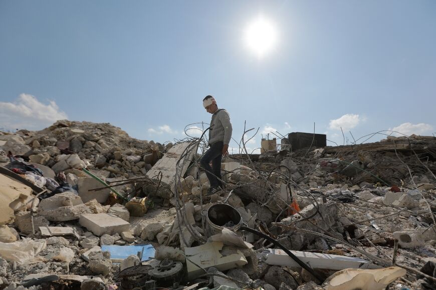 Destroyed homes in Jindayris, in the rebel-held part of Syria's Aleppo province, where the UN said sufficient aid had failed to arrive