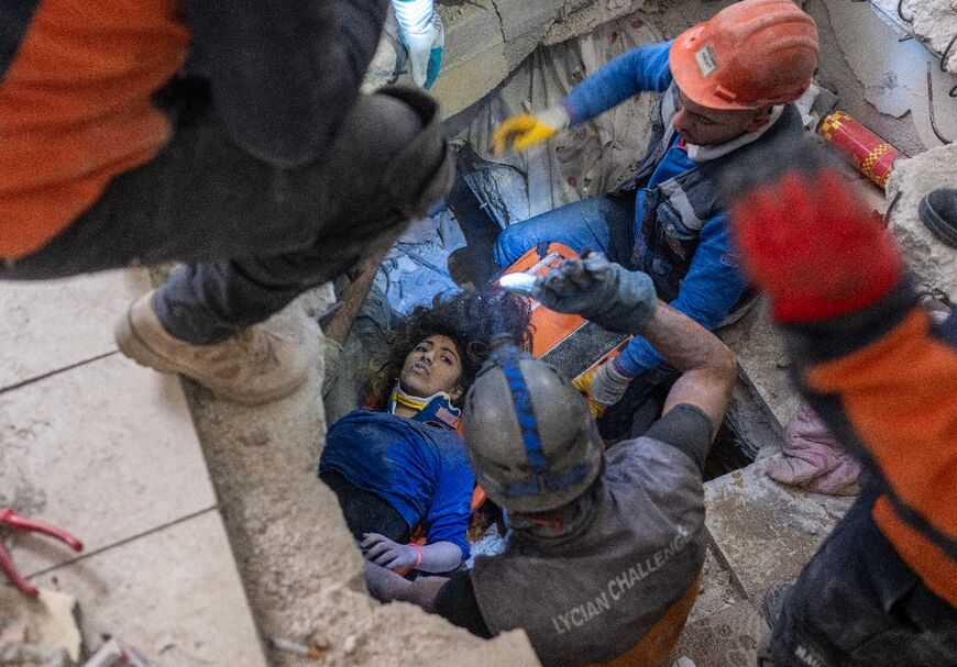 Crews rescue a 16-year-old girl from the rubble in southern Turkey