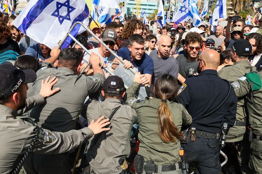Police employed stun grenades, water cannon and officers on horseback in a rare use of force in Tel Aviv