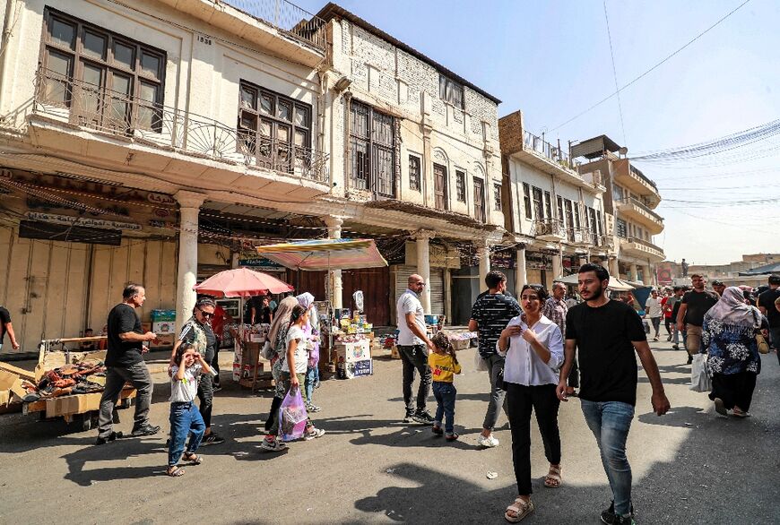 Azoulay stopped in Al-Mutanabbi Street, which has long drawn bibliophiles and has been renovated