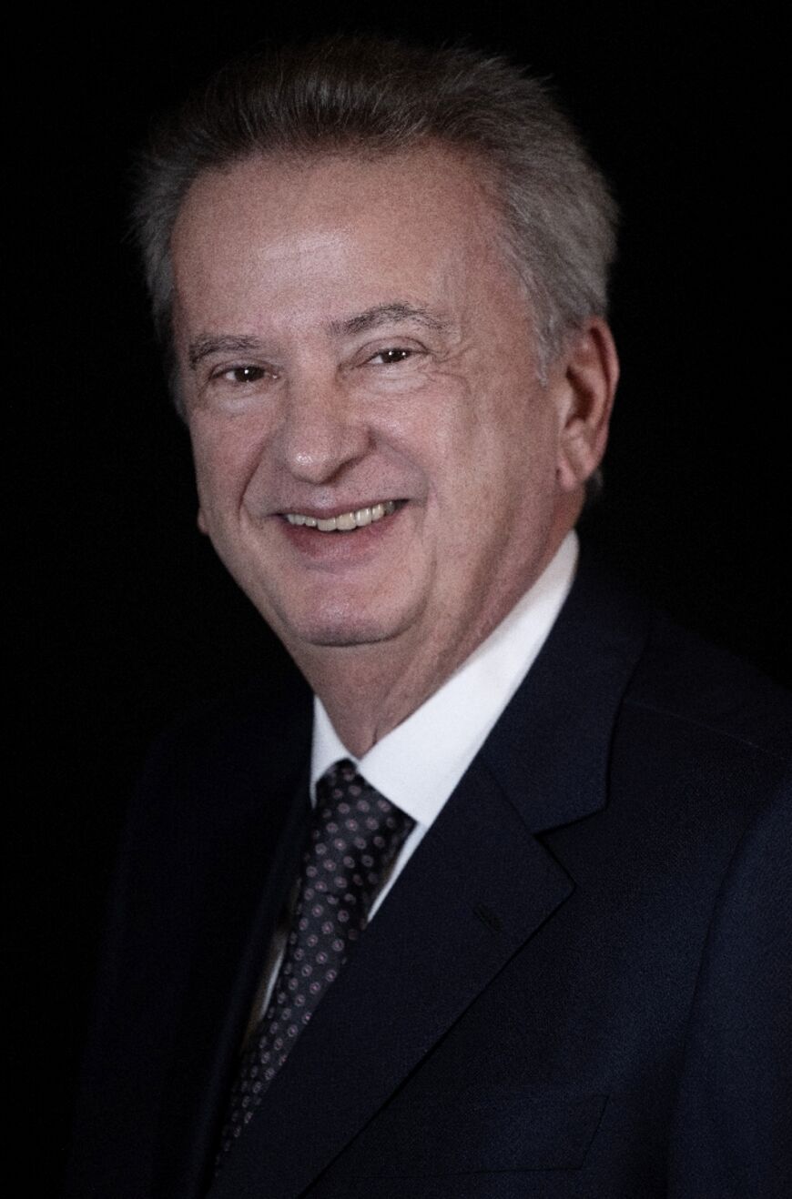 Lebanon's Central Bank Governor Riad Salameh poses during a studio photo session in the capital Beirut, on December 20, 2021 