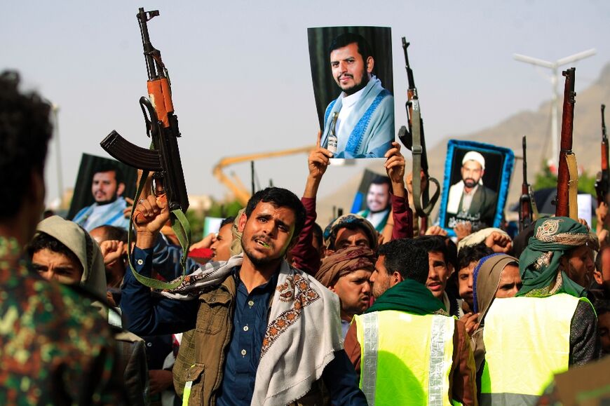 Yemen's Iran-backed Huthi rebels rally in the capital Sanaa last June. Analysts warn that a thaw in relations between Tehran and the embattled government's main backer Riyadh is no "magic wand" for peace