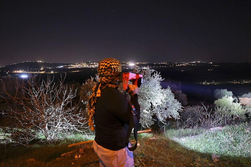 The volunteer guards say they must stay vigilant as Israeli settlers have set up base in hilltop outposts all round their village of Turmus Ayya in the northern West Bank